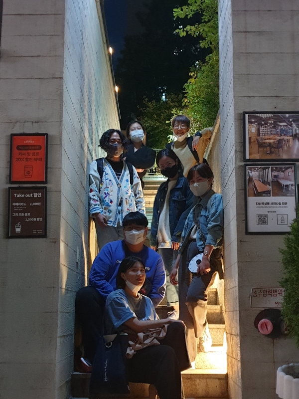 Members of Gongdeok-dong House, one of the most famous non-maritalcommunities, poses in front of a building.Photo provided by Gongdeok-dong House