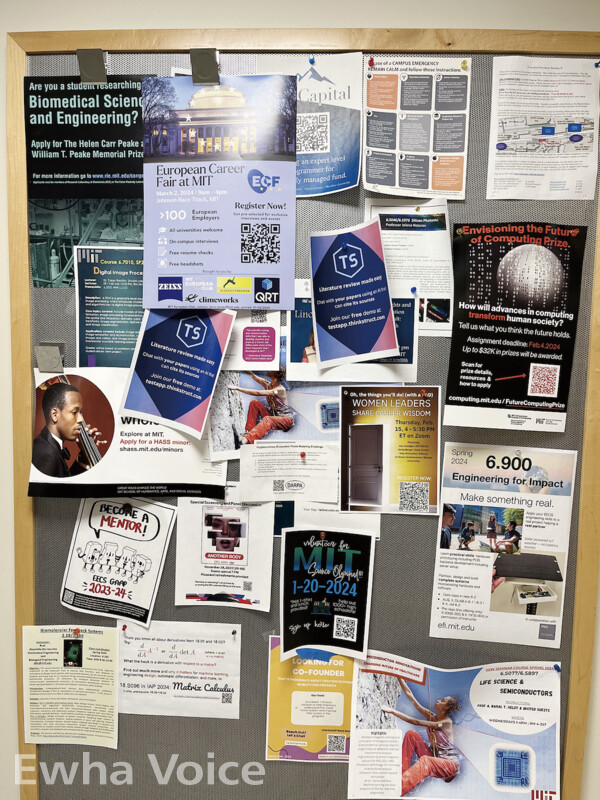 The walls of MIT campus buildings display posters from various educational institutions promoting collaborative projects. Photo by Lee Soyoon