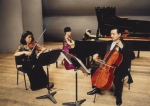 Soma Trio, an ensemble composed of professors, performs for charity
concerts. Ewha Professor Bai Il- hwan is the cellist.