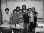 An Hye-jung (middle in the back row) teaches mathematics to her students who are even older than her mother with a wholehearted attitude.