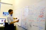 Solin is writing formulas on the white board in his office. Photo by Kim So-jung.