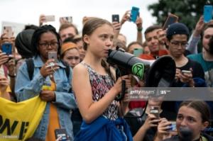 17-year-old environmental activist Greta Thunberg was named Time’s 2019 person of the year. The Greta Effect, a term coined by UK media regulator Ofcom, denotes the trend of young people participating in online activism. Photo by Sarah Silbiger/Getty Images.