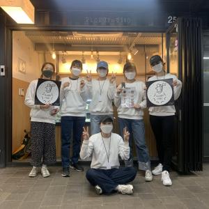 Planet-V130 members gather in front of their vegan bakery at Sinchon Boxsquare. Photo provided by Planet-V130