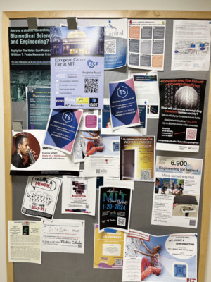 The walls of MIT campus buildings display posters from various educational institutions promoting collaborative projects. Photo by Lee Soyoon